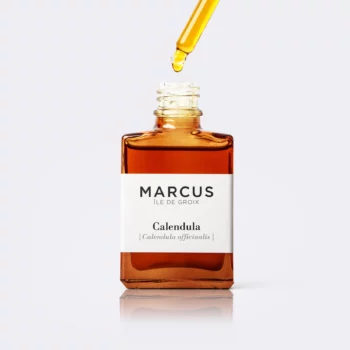 Packshot de l'huile de calendula de Marcus, produit local de l'île de Groix, un soin naturel fabriqué avec des ingrédients bretons.